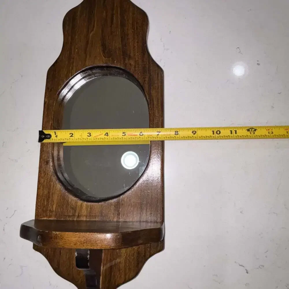 Vintage Wall-Mounted Dark Wood Sconce with Oval Mirror and Shelf